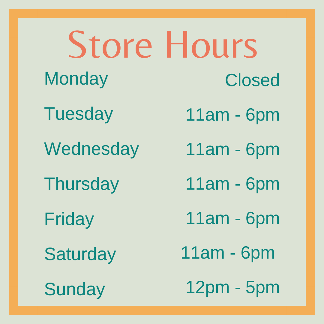 Image shows a blue wood textured background with Cherry blossoms around the side. Test on the image says: Store Hours:  Monday - CLOSED<br />
Tuesday - 11am to 5pm<br />
Wednesday - 11am to 5pm<br />
Thursday - 11am to 5pm<br />
Friday - 11am to 5pm<br />
Saturday - 11am to 5pm<br />
Sunday - 12pm to 5pm